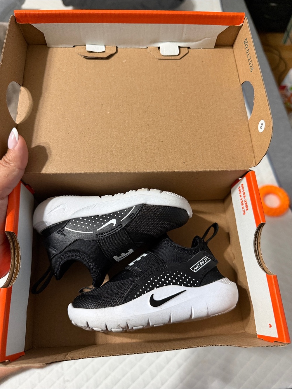 Nike Kids Black and White Slip-On Sneakers with Dotted Detail